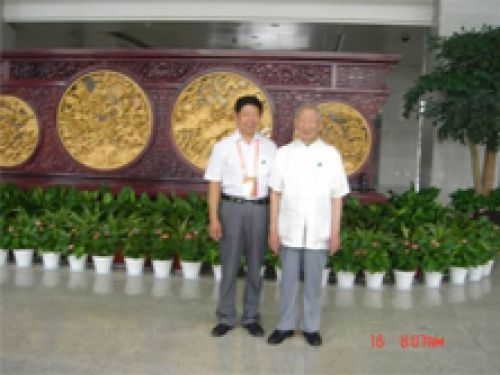 王玉德院长与武汉大学哲学学院教授唐明邦先生合影